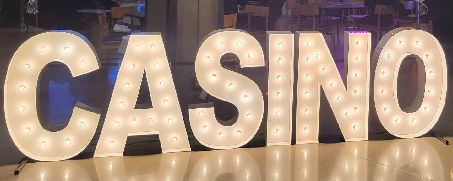 White marquee letters spelling CASINO