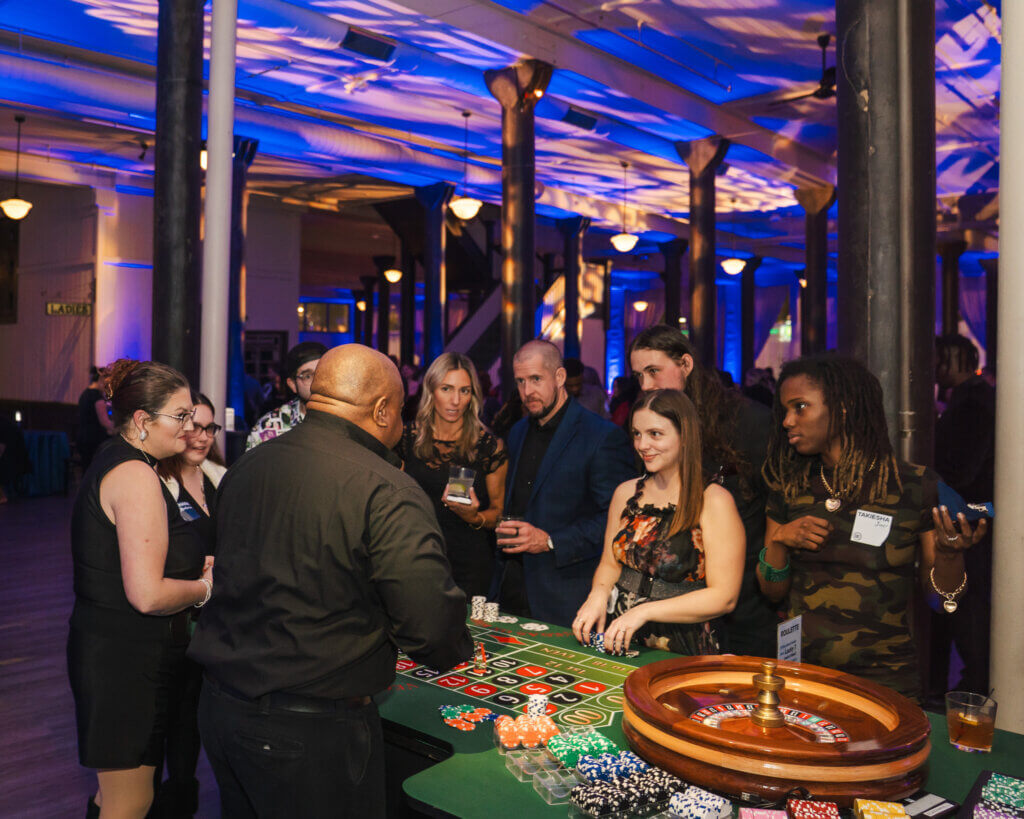 casino night tables and dealers at event in Wisconsin